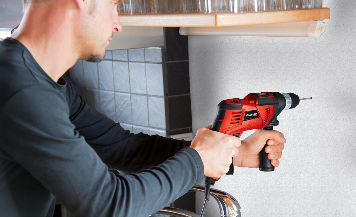 Einhell TC-ID 550 E ütvefúró, 550 W, elektronikus fordulatszám-szabályozás, fordulatszám-előválasztás, mindkét irányú forgás, fém mélységütköző, pótfogantyú