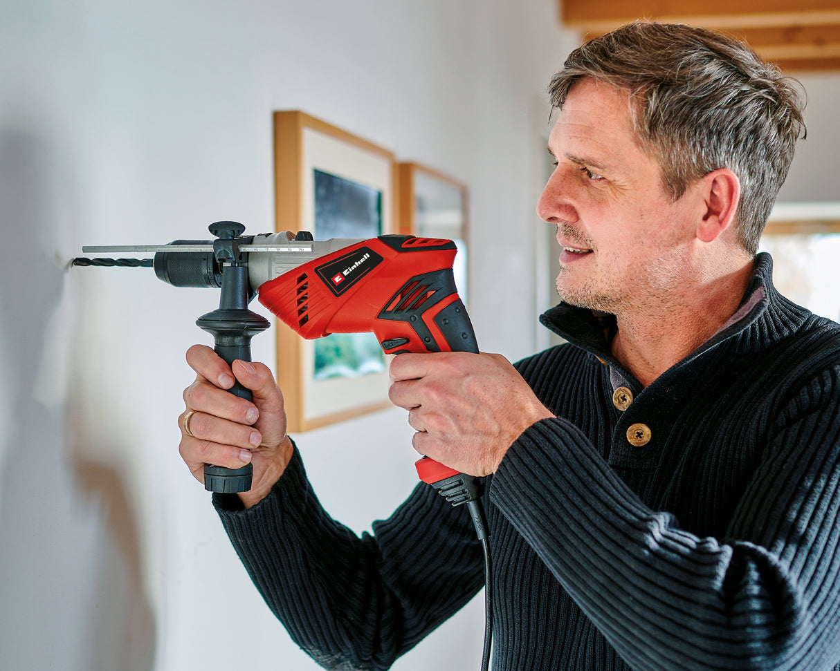 Masina de gaurit si insurubat (bormasina) cu impact Einhell TE-ID 650 E, 650 W, mandrina metalica de calitate, rotatie in ambele sensuri, opritor de adancime pentru gaurire in metal, blocare a axului „press&lock”