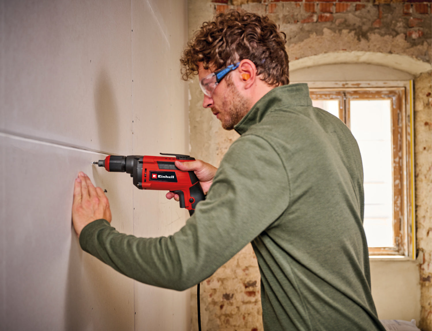 Surubelnita pentru gips-carton Einhell TC-DY 710 E (710 W, opritor de adancime reglabil, 4.000 rpm, turatie maxima in gol, control al vitezei, functie de functionare continua